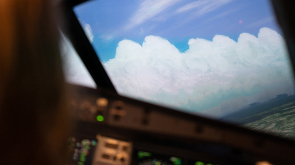 Blick aus dem Fenster eines Flugzeugcockpits