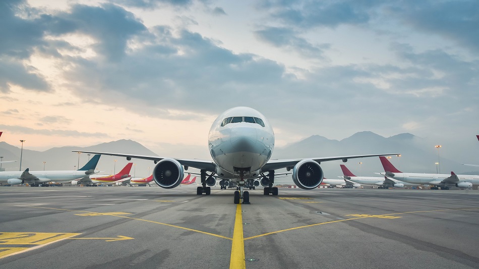 An Airbus A320 stands on an apron.